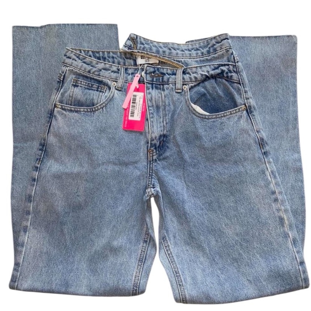 Beginning Boutique “Kansis Light Blue Uneven Waist Jeans